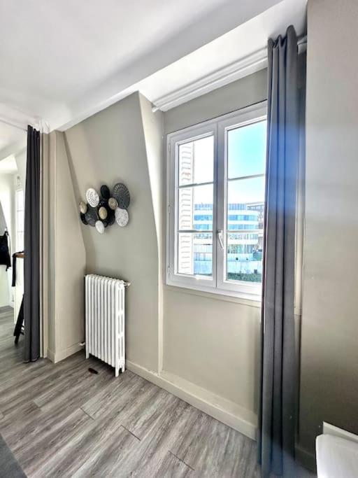 Appartement Vue Tour Eiffel Ligne 14 A Cote De Paris Gentilly Dış mekan fotoğraf