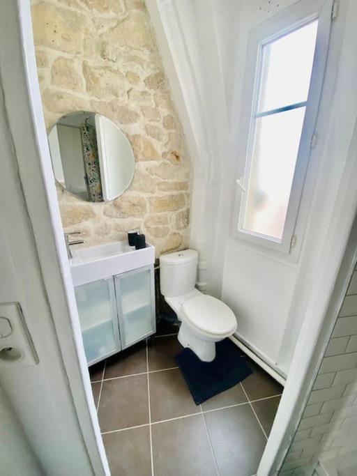 Appartement Vue Tour Eiffel Ligne 14 A Cote De Paris Gentilly Dış mekan fotoğraf
